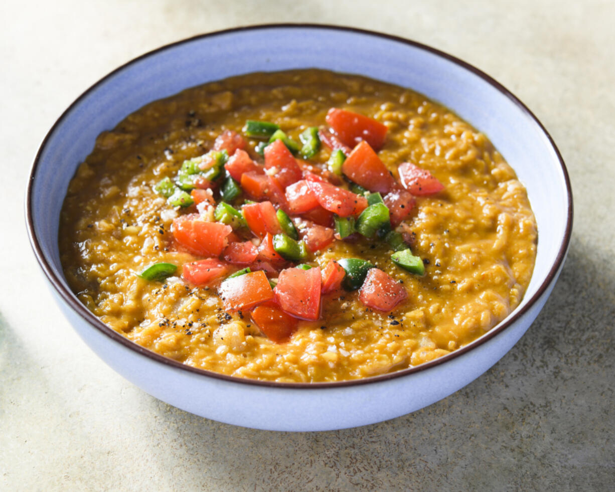 This image released by Milk Street shows a recipe for berbere spiced lentils.