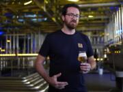 Head Brewmaster Tobias Zollo gestures Sept. 20 at the Weihenstephan brewery in Freising, Germany,.