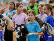 Competitors are instructed during the first German Hobby Horsing Championship in Frankfurt, Germany, Saturday, Sept. 14, 2024.