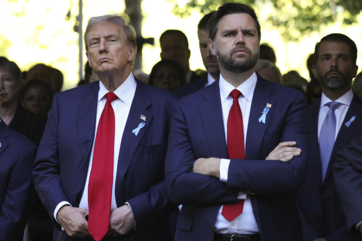 FILE - Republican presidential nominee former President Donald Trump and Republican vice presidential nominee Sen. JD Vance, R-Ohio, attend the 9/11 Memorial ceremony on the 23rd anniversary of the Sept. 11, 2001 attacks, Wednesday, Sept. 11, 2024, in New York.