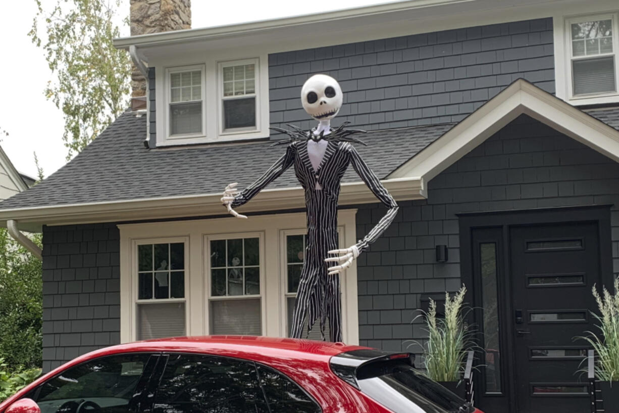 A towering figure of Jack Skellington from the film &ldquo;The Nightmare Before Christmas&rdquo; appears in front of a house in Westchester County, N.Y., on Sept. 23, 2024. The giant skeletons have upped the game on decorations, and Halloween superfans are thrilled.