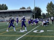 Heritage receivers Jacob Karpyuk (5) and Dakari Bradford (4) line up during a non-league football game against Kentlake on Friday, Sept. 27, 2024 at McKenzie Stadium.