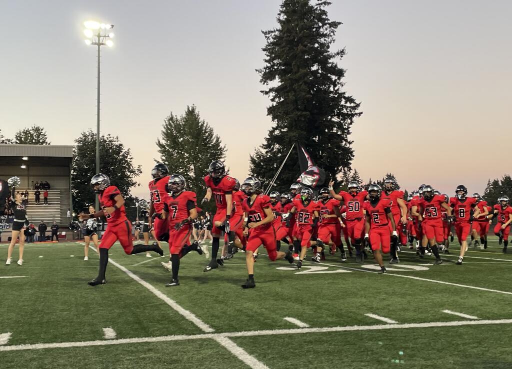 Union football players run on to the field at McKenzie Stadium prior to the start of a non-league football game against Mountan View on Friday, Sept. 20, 2024.