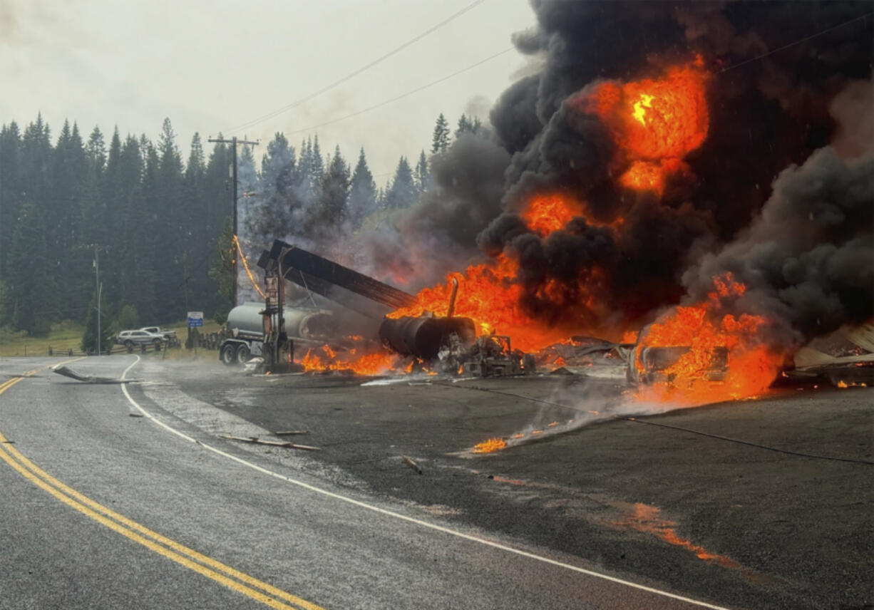 A fire burns at the gas station after an explosion on Wednesday, Sept. 12, 2024 in Cardiff, Idaho.