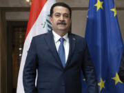 FILE - Iraqi Prime Minister Mohammed al-Sudani poses for a photo at the Munich Security Conference in Munich, Germany, Feb. 17, 2024.