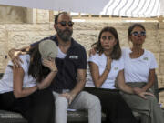 Jonathan Polin and Rachel Goldberg parents, and sisters Orly and Leebie of Israeli-American hostage Hersh Goldberg-Polin, who was killed in Hamas captivity in the Gaza Strip, attend the funeral in Jerusalem, Monday, Sept. 2, 2024.