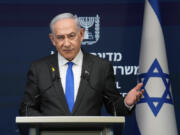 Israeli Prime Minister Benjamin Netanyahu speaks during a news conference in Jerusalem, Monday, Sept.