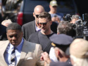 Justin Timberlake, center, walks into court for his arraignment, Friday, Sept. 13, 2024, in Sag Harbor, N.Y.