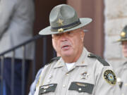 Laurel County Sheriff John Root addresses the media to give an update on the efforts to find the suspect in the shooting at I-75 at the Livingston Ky. exit at the Laurel County Sheriff&#039;s Office in London, Ky., Monday, Sept. 9, 2024. (AP Photo/Timothy D.