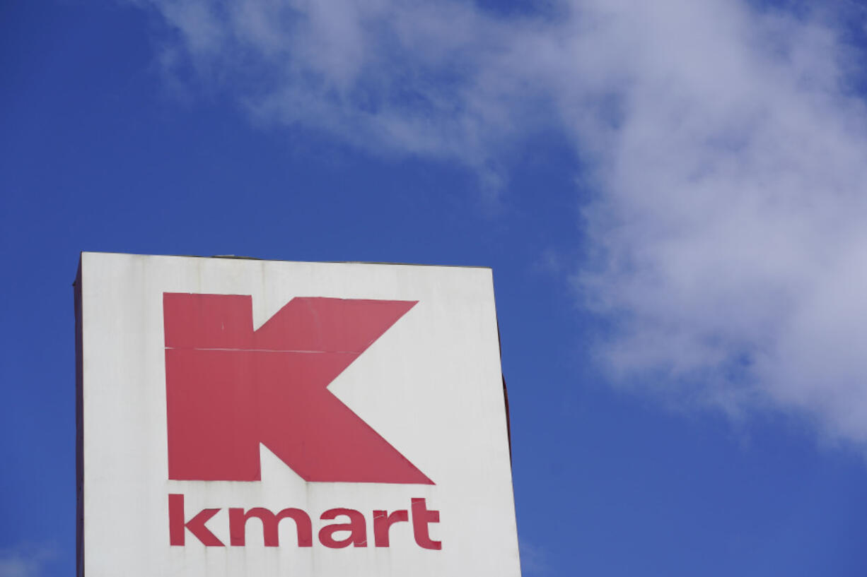 FILE - A large Kmart sign is displayed in front of a shopping plaza in Avenel, N.J., April 4, 2022.