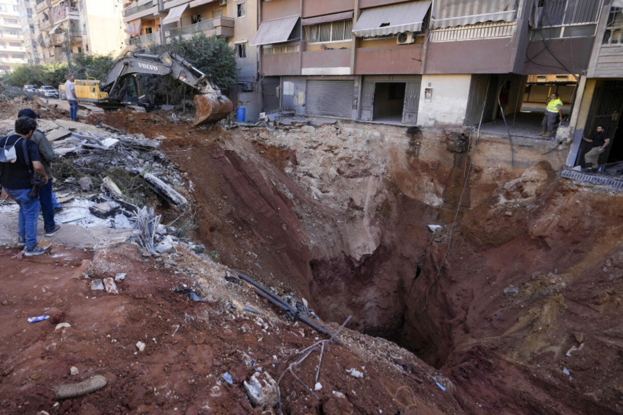 A hole in the ground near the site of the assassination of Hezbollah leader Hassan Nasrallah in Beirut&rsquo;s southern suburbs, Sunday, Sept. 29, 2024.