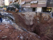 A hole in the ground near the site of the assassination of Hezbollah leader Hassan Nasrallah in Beirut&rsquo;s southern suburbs, Sunday, Sept. 29, 2024.