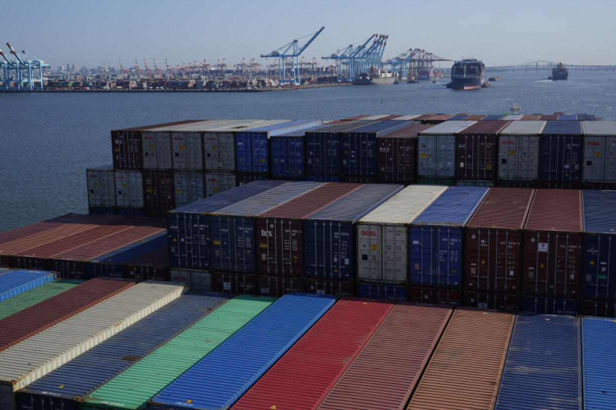 A container ship makes it way toward the Port of New York and New Jersey in Elizabeth, N.J., on June 30, 2021.