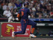 Houston Astros&#039; Jeremy Pe&ntilde;a hits an infield single during the second inning of a baseball game against the Seattle Mariners, Monday, Sept. 23, 2024, in Houston. (AP Photo/Kevin M.