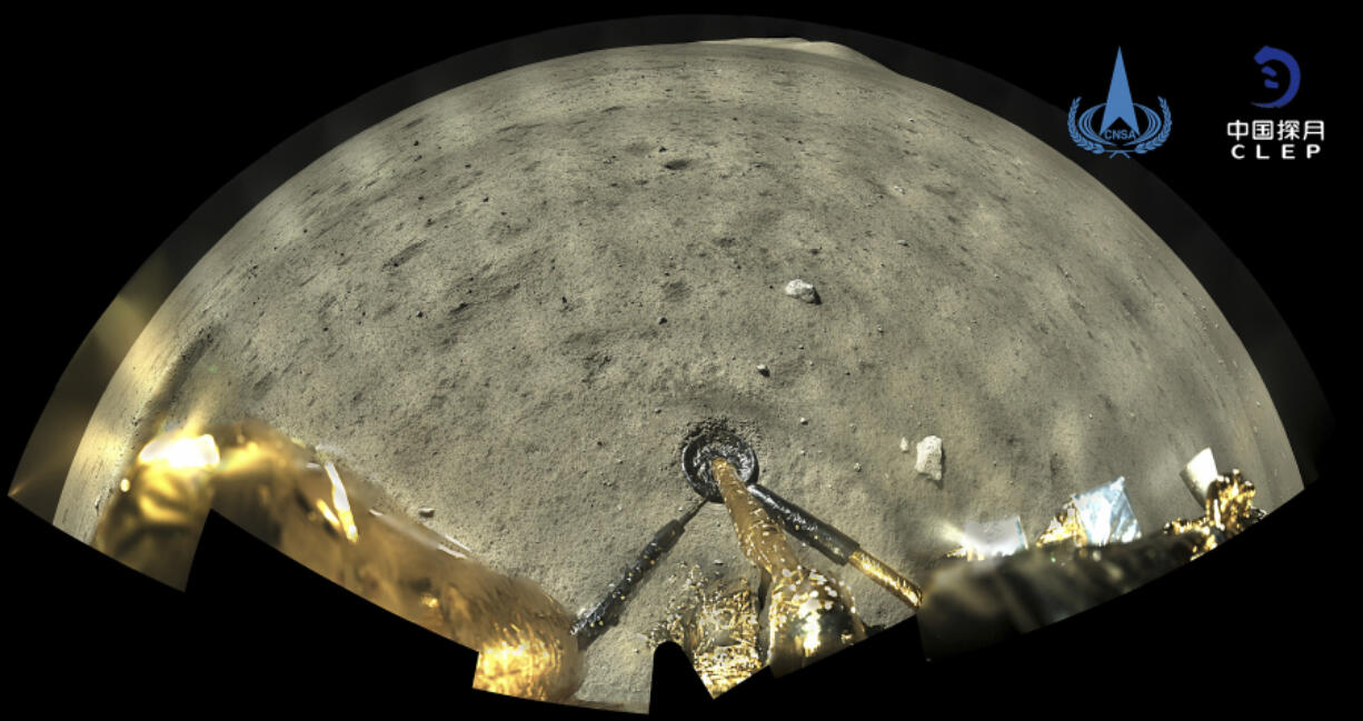 FILE - This Dec. 2, 2020, file image taken by panoramic camera aboard the lander-ascender combination of Chang&#039;e-5 spacecraft provided by China National Space Administration shows a moon surface after it landed on the moon.