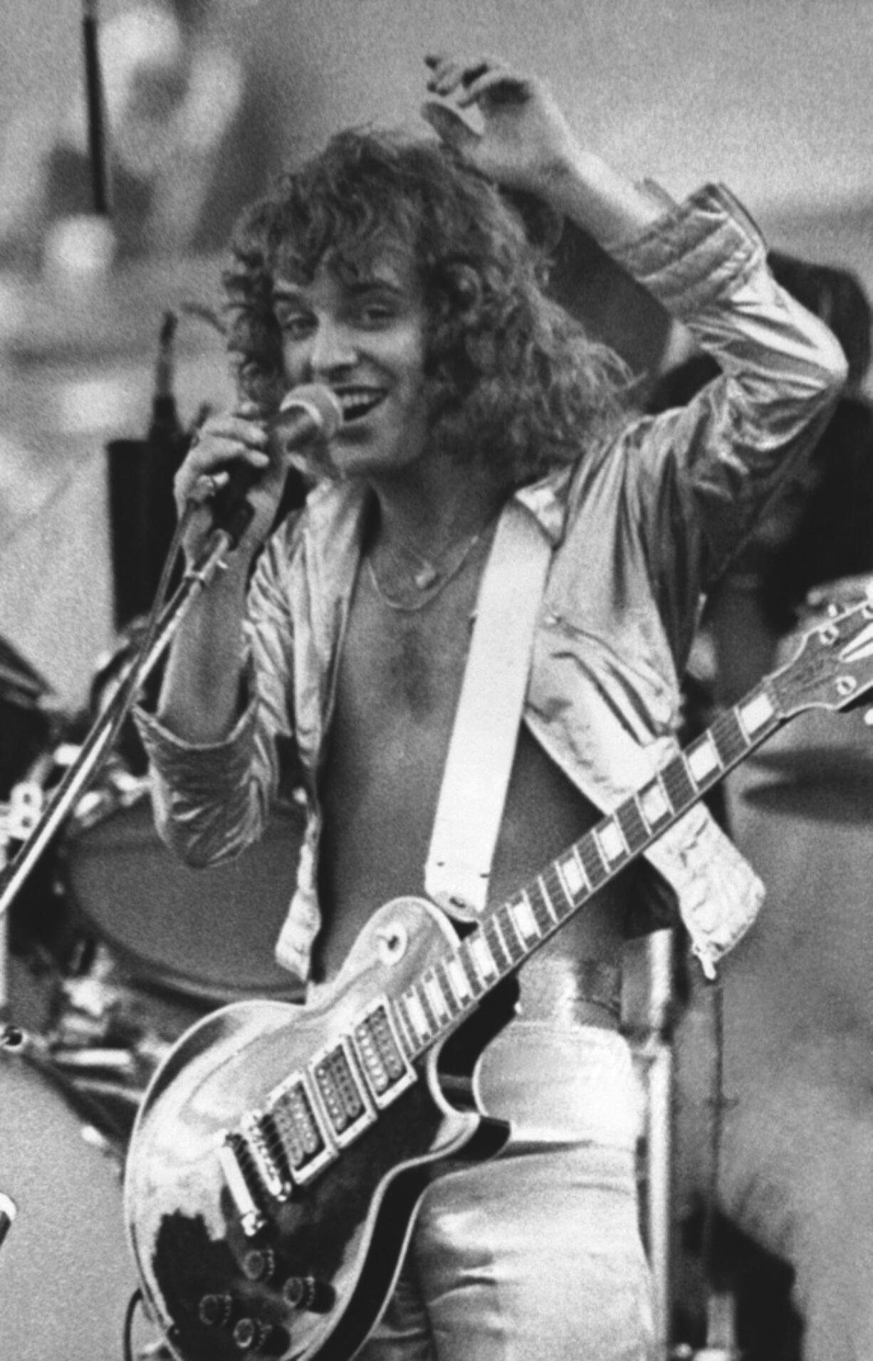 FILE - Peter Frampton performs during a concert at JFK Stadium in Philadelphia Saturday, June 11, 1977.