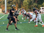 Hudson's Bay, left, and Napavine faced off in a season-opening football game Friday, Sept. 6, 2024 at Kiggins Bowl in Vancouver.