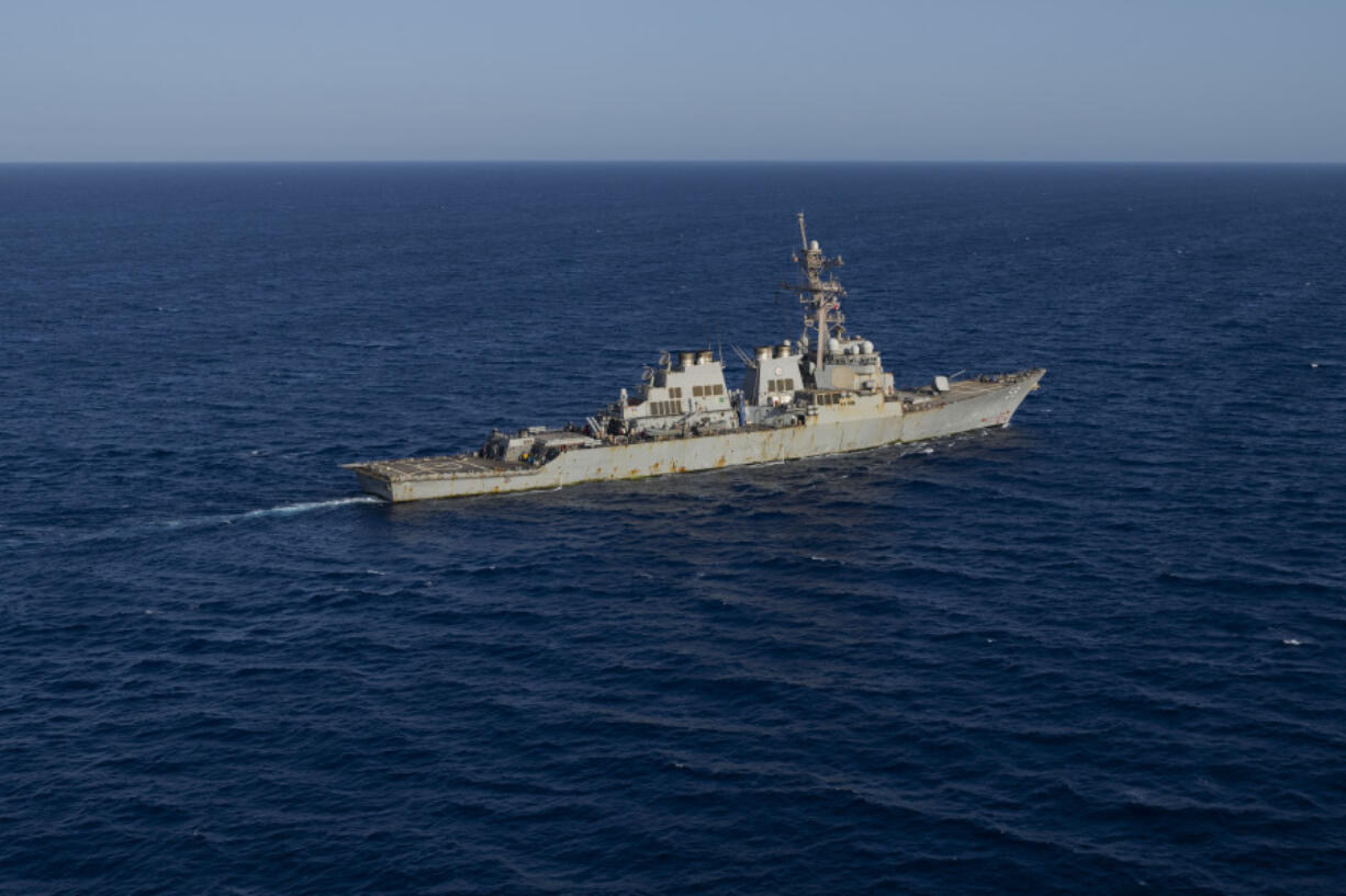 FILE - The Arleigh Burke-class guided missile destroyer USS Laboon sails in the Red Sea, June 12, 2024.