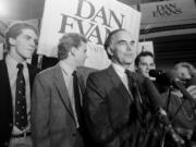 Sen. Dan Evans stands with his three sons &mdash; from left, Mark, Bruce and Dan Jr. &mdash; on Nov. 8, 1983, in Seattle after he won the election for Washington&rsquo;s U.S. Senate seat.