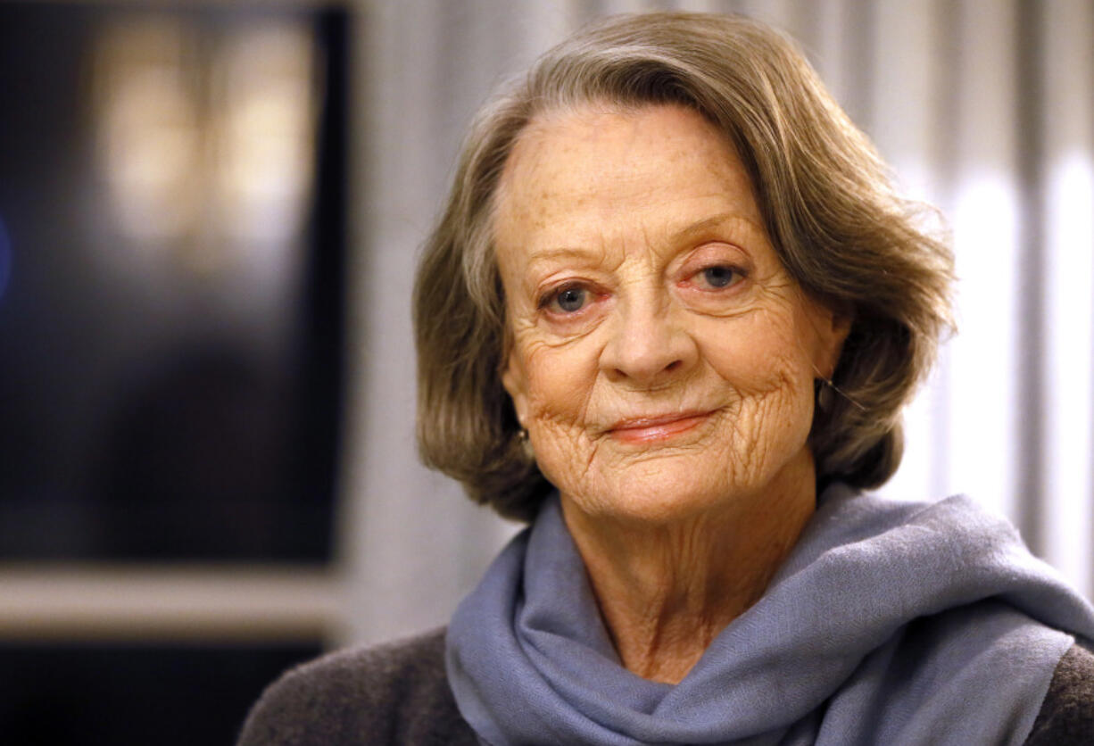 FILE - British actress Dame Maggie Smith poses in London on Dec. 16, 2015. Smith, who won an Oscar for &ldquo;The Prime of Miss Jean Brodie&rdquo; in 1969 and won new fans in the 21st century as the dowager Countess of Grantham in &ldquo;Downton Abbey,&rdquo; has died at 89.