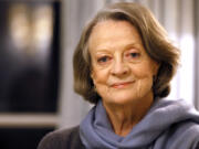 FILE - British actress Dame Maggie Smith poses in London on Dec. 16, 2015. Smith, who won an Oscar for &ldquo;The Prime of Miss Jean Brodie&rdquo; in 1969 and won new fans in the 21st century as the dowager Countess of Grantham in &ldquo;Downton Abbey,&rdquo; has died at 89.