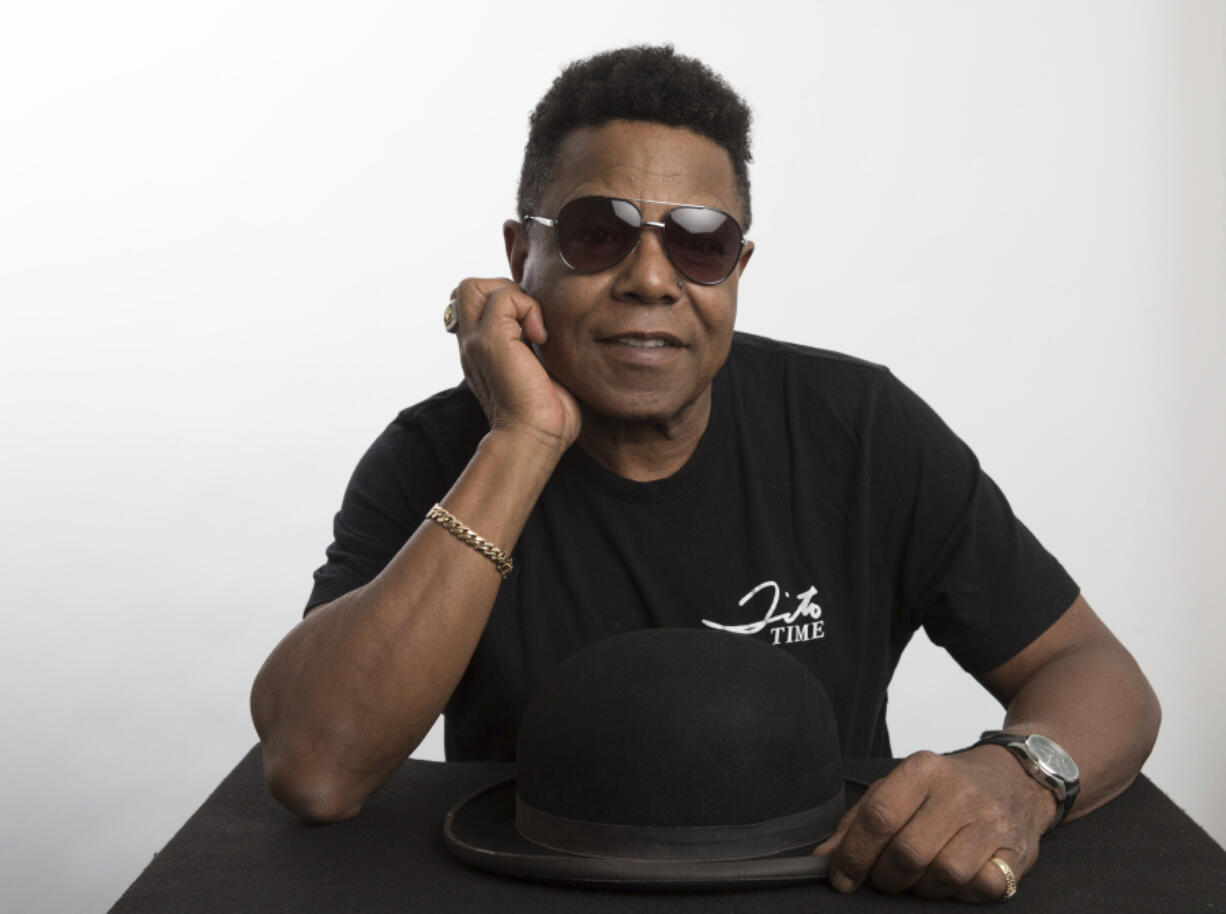 FILE - Tito Jackson, a member of the famed Jackson 5, poses for a portrait in Los Angeles, July 24, 2019, to promote his solo project, a new version of his 2017 song &quot;One Way Street.&quot; (Photo by Mark Von Holden/Invision/AP, File)