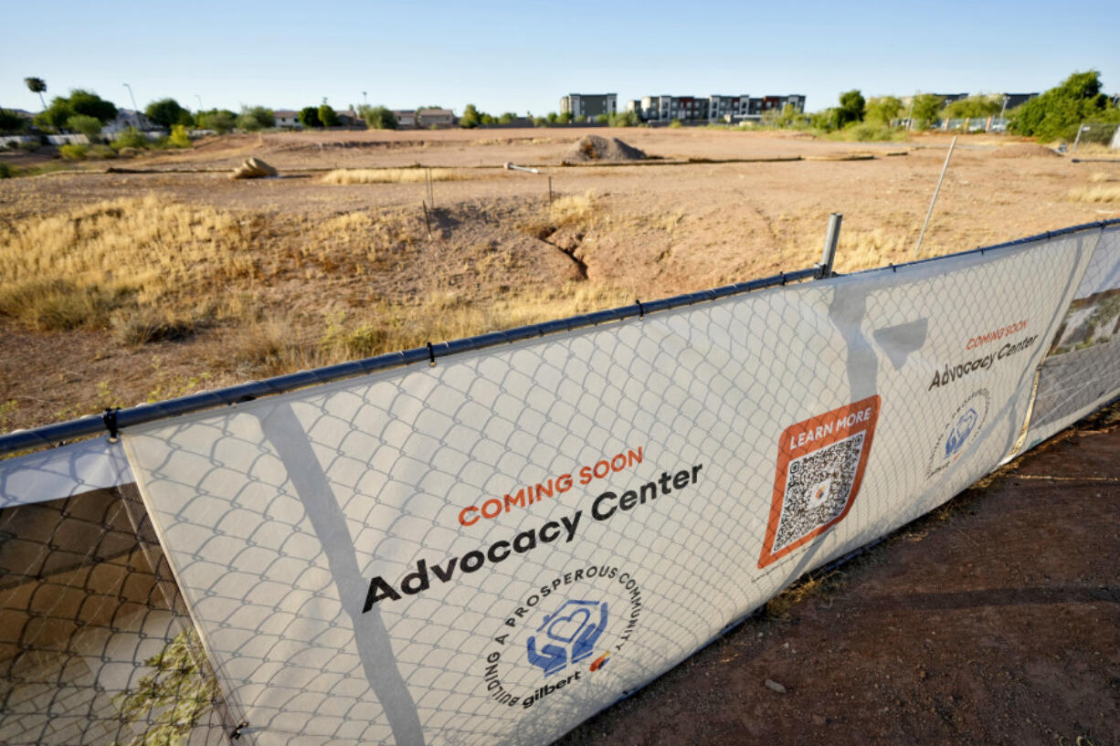 The lot of the future victims&#039; advocacy center is shown, Wednesday, Sept. 4, 2024 in Gilbert, Ariz. The town has obligated only one-quarter of funds received through the American Rescue Plan for projects, according to the most recent data from the federal government. Construction on the dirt lot near its fire department for the advocacy center remain unrealized.