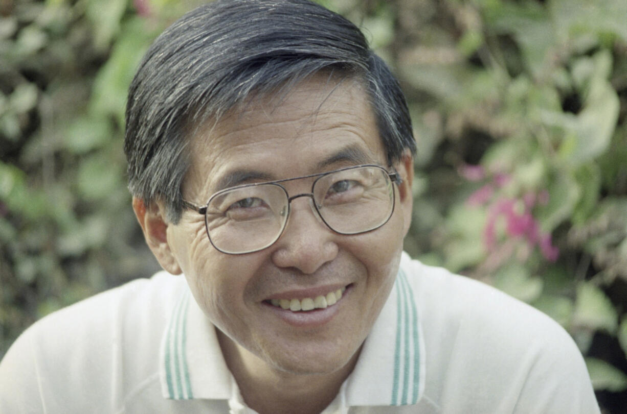 FILE - Peruvian presidential candidate Alberto Fujimori poses for a photo, April 8, 1990. His daughter Keiko Fujimori announced in a post on X that he died of cancer on Wednesday, September 11, 2024.