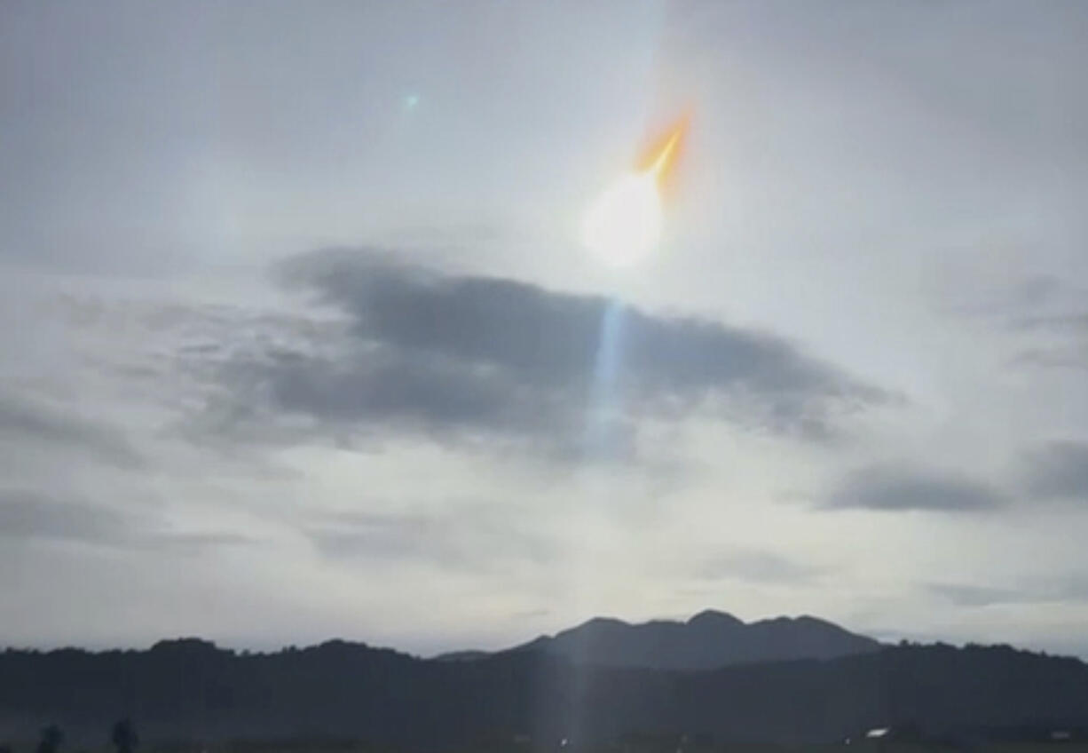 In this photo grabbed from a video, a space rock dubbed 2024 RW1 is seen over Progressive village, Gonzaga, Cagayan province, Philippines, early Thursday September 5, 2024. (Allan G.