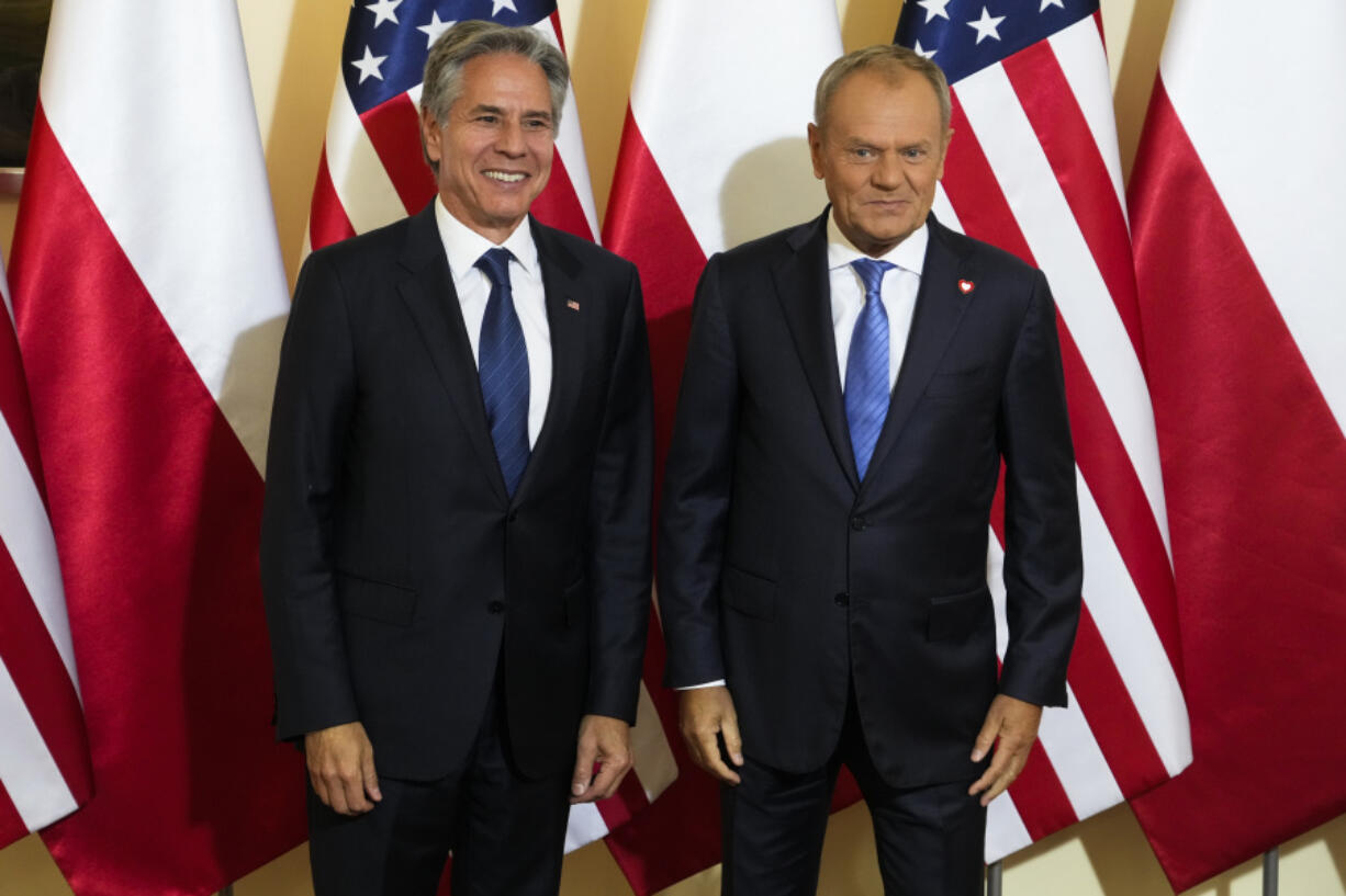 Poland&#039;s Prime Minister Donald Tusk, right, welcomes U.S. Secretary of State, Antony Blinken, left, for a meeting in Warsaw, Poland, Thursday, Sept. 12, 2024.