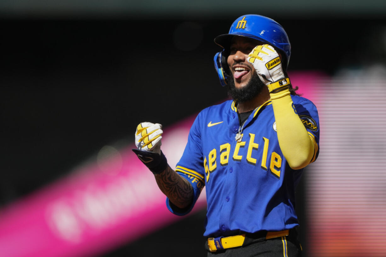 Seattle Mariners&#039; J.P. Crawford reacts to hitting a single against the Texas Rangers during the sixth inning of a baseball game Sunday, Sept. 15, 2024, in Seattle.