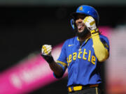 Seattle Mariners&#039; J.P. Crawford reacts to hitting a single against the Texas Rangers during the sixth inning of a baseball game Sunday, Sept. 15, 2024, in Seattle.