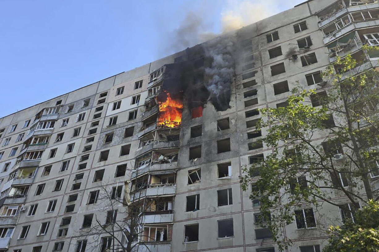 Flames rise after a Russian aerial bomb struck a multi-story residential building in Kharkiv, Ukraine, Sunday Sept. 15, 2024.