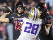 Rutgers quarterback Athan Kaliakmanis (16) throws a pass during the first half of an NCAA football game against Washington, Friday, Sept. 27 2024, in Piscataway, N.J.