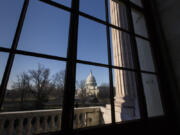 The Capitol is seen from the Russell Senate Office Building as Congress returns from a district work week, in Washington, March 24, 2014.  (AP Photo/J.