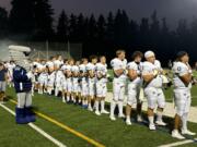 Skyview football players stand for the national anthem before a season-opening game against Radford of Hawaii on Friday, Sept, 6, 2024 at Kiggins Bowl in Vancouver (Micah Rice/The Columbian)