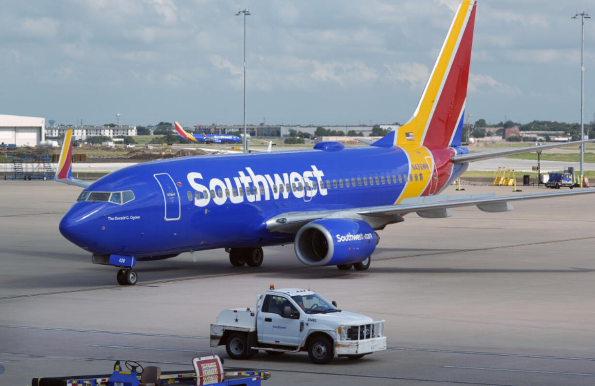 FILE - A Southwest Airlines plane moves to depart from Love Field in Dallas, July 25, 2024.