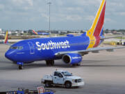 FILE - A Southwest Airlines plane moves to depart from Love Field in Dallas, July 25, 2024.