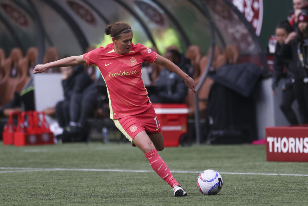 FILE - Portland Thorns FC midfielder Christine Sinclair (12) controls the ball during an NWSL soccer match against NJ/NY Gotham FC in Portland, Ore., March 24, 2024.