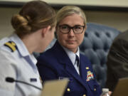 Lt. Cmdr. Nicole Emmons, U.S. Coast Guard Marine Board of Investigation technical advisor, center right, speaks with board members, Wednesday, Sept. 25, 2024, at the U.S. Coast Guard Marine Board of Investigation hearing into the June 2023 loss of the Titan submersible, in North Charleston, S.C. (Petty Officer 2nd Class Kate Kilroy/U.S.