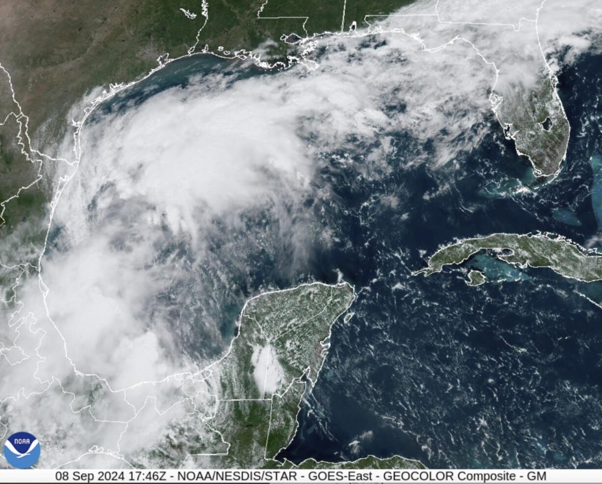 This Sunday, Sept. 8, 2024 satellite image provided by the National Oceanic and Atmospheric Administration shows a tropical disturbance in the Gulf of Mexico expected to bring significant rainfall to parts of Texas and Louisiana this week, possibly developing into a stronger storm, including a hurricane, according to the National Weather Service.