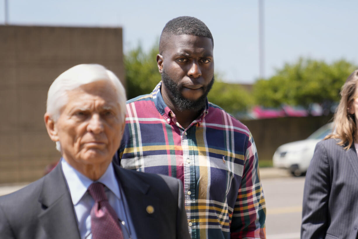 Emmitt Martin III, a former Memphis Police Department officer, second from left, accused of killing Tyre Nichols, walks into federal court Friday, Aug. 23, 2024, in Memphis, Tenn.