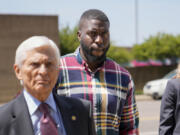 Emmitt Martin III, a former Memphis Police Department officer, second from left, accused of killing Tyre Nichols, walks into federal court Friday, Aug. 23, 2024, in Memphis, Tenn.