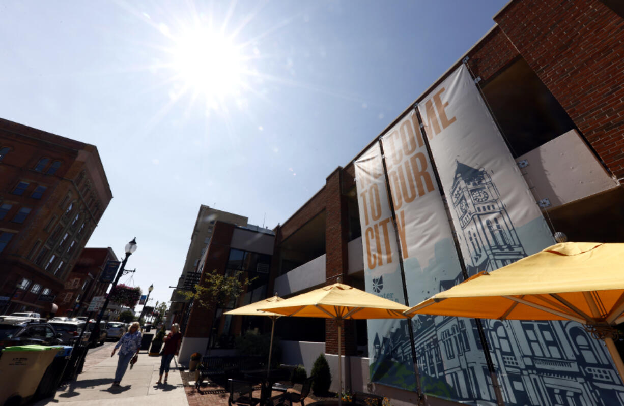 Pedestrians walk down Fountain Avenue in Springfield, Ohio, Wednesday, Sept. 11, 2024.