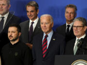 U.S. President Joe Biden, center, with Ukraine&rsquo;s President Volodymyr Zelenskyy, left, Britain&rsquo;s Prime Minister Keir Starmer, right, and other world leaders pose for a family picture of the launching of a Joint Declaration of Support for Ukrainian Recovery and Reconstruction, Wednesday, Sept. 25, 2024, in New York.