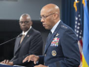 FILE - Chairman of the Joint Chiefs of Staff Gen. CQ Brown Jr., speaks during a press briefing with Defense Secretary Lloyd Austin, left, April 26, 2024 at the Pentagon in Washington.