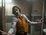 This image released by Warner Bros. Pictures shows Joaquin Phoenix in a scene from &ldquo;Joker.&rdquo; (Niko Tavernise/Warner Bros.