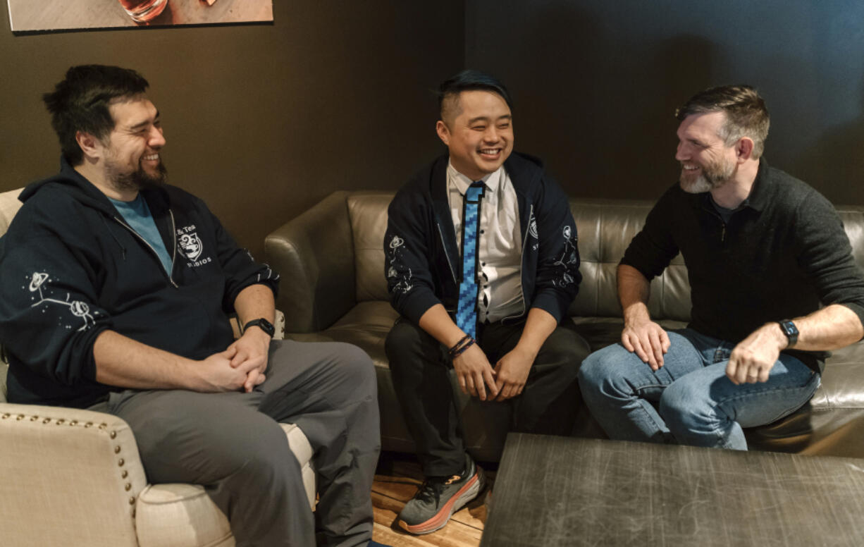 Jam &amp; Tea Studios founders, left to right, Michael Yichao, Carl Kwoh, and J. Aaron Farr sit for photos on Jan. 18, 2024, in Roslyn, Wash.