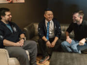 Jam &amp; Tea Studios founders, left to right, Michael Yichao, Carl Kwoh, and J. Aaron Farr sit for photos on Jan. 18, 2024, in Roslyn, Wash.