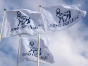 This undated photo provided by Novo Nordisk shows flags bearing the company's logo.